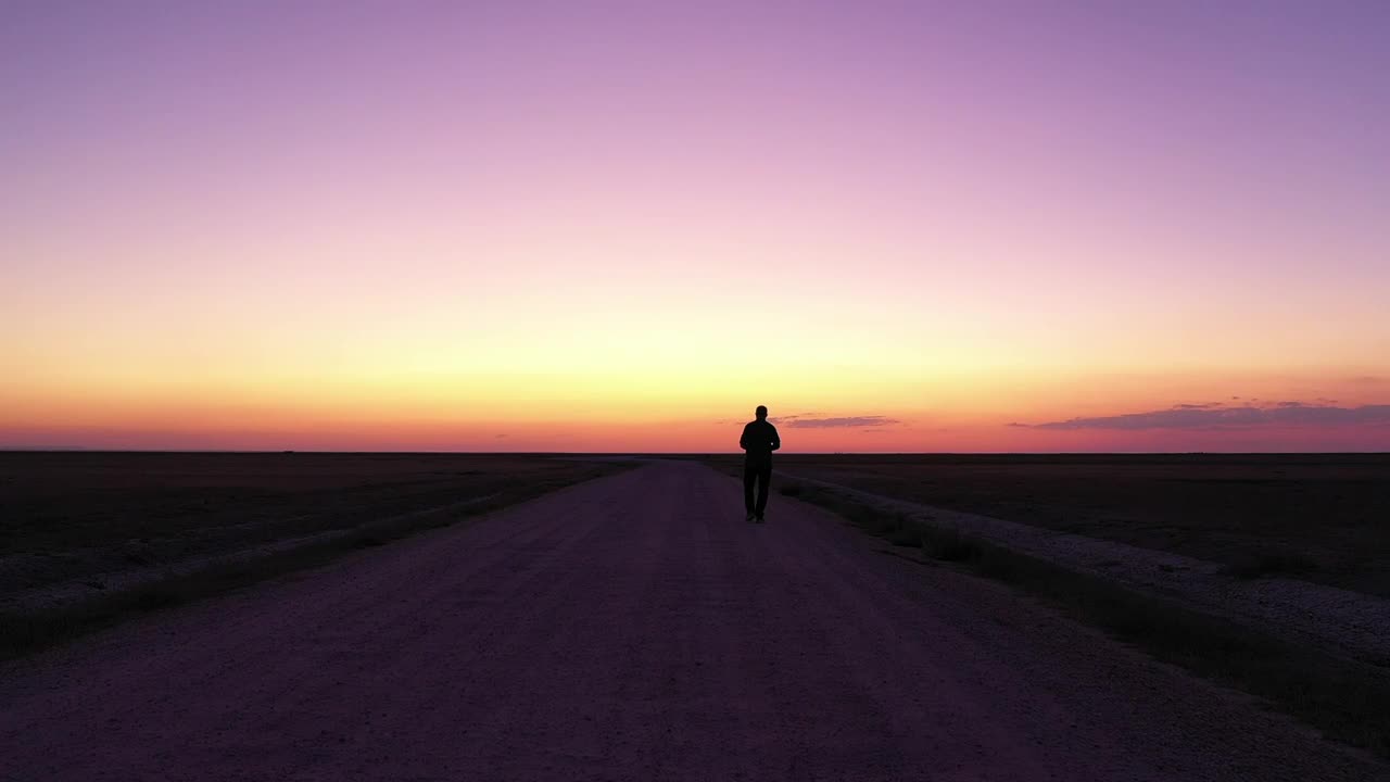 Stock Video Man Walking Down An Empty Roa Animated Wallpaper - Free Download