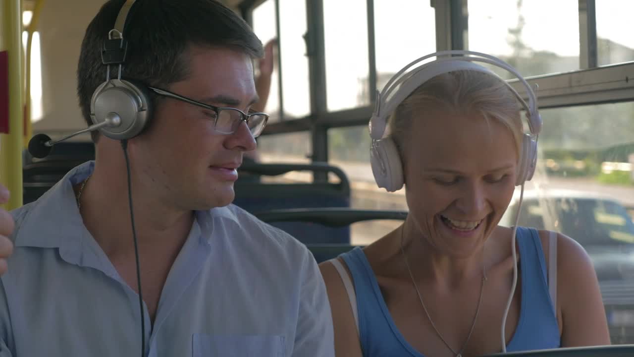 Stock Video Couple Listening To Music On A Bus Live Wallpaper For PC - Free Download
