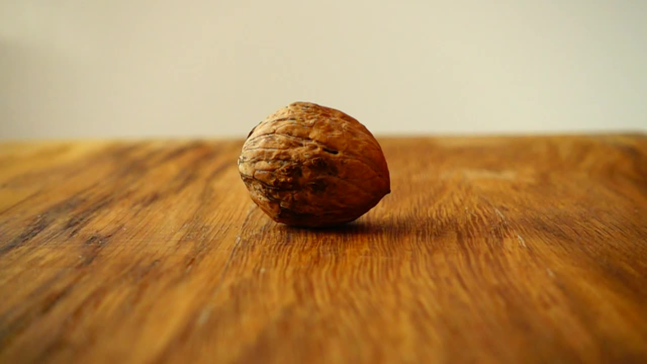 Free Video Stock Splitting A Walnut With A Hammer Live Wallpaper - Free Download