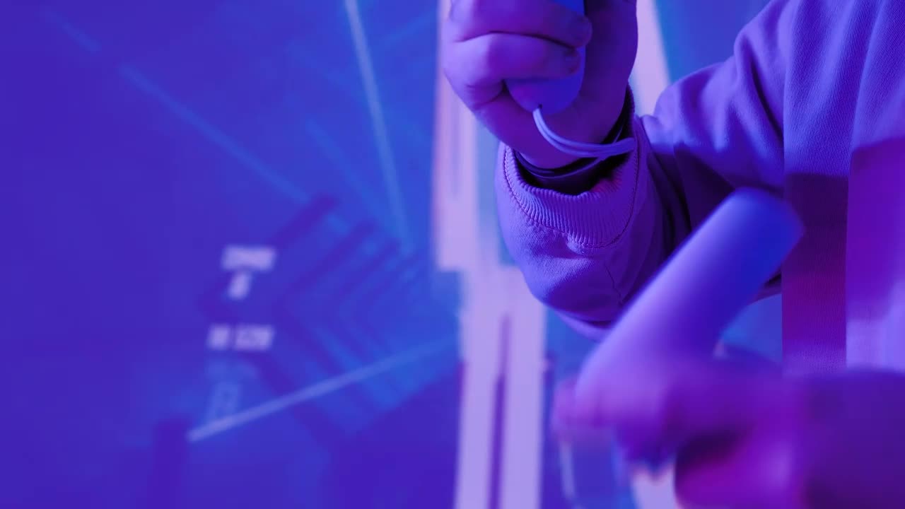 Stock Video Man With Controllers In A Gamer Environmen Animated Wallpaper - Free Download