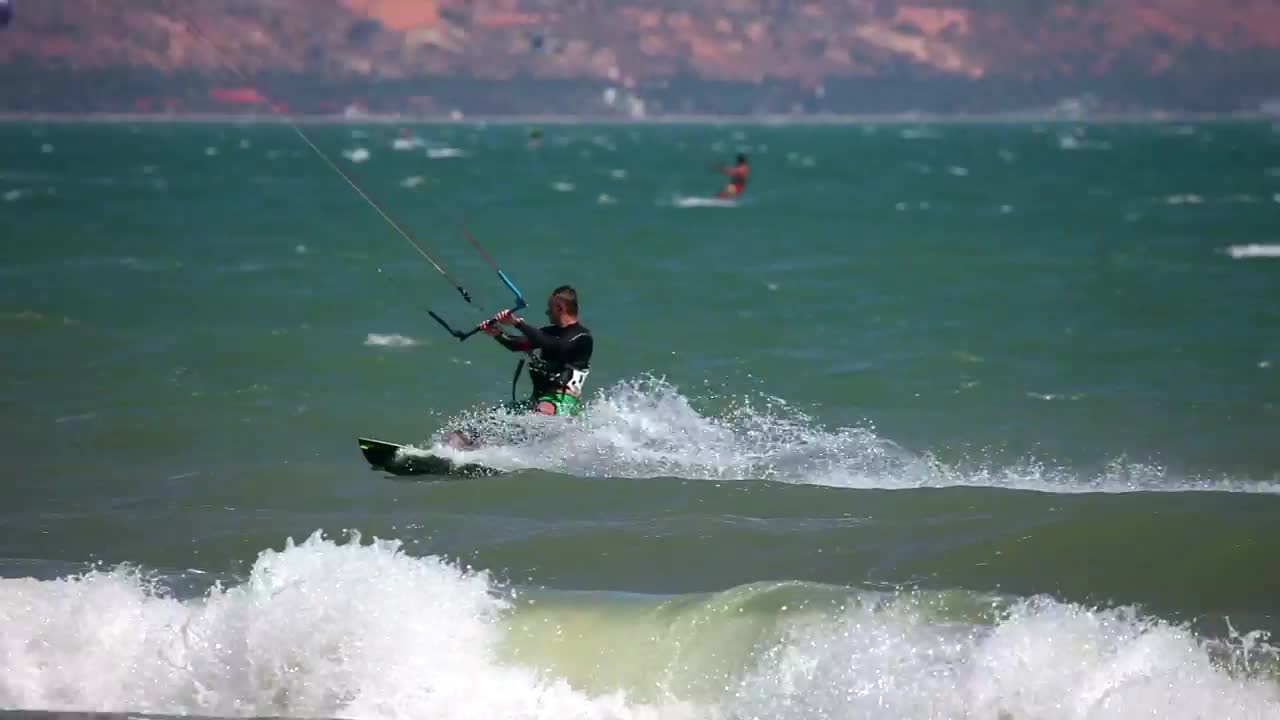 Stock Video Kite Surfer Riding The Waves Animated Wallpaper - Free Download