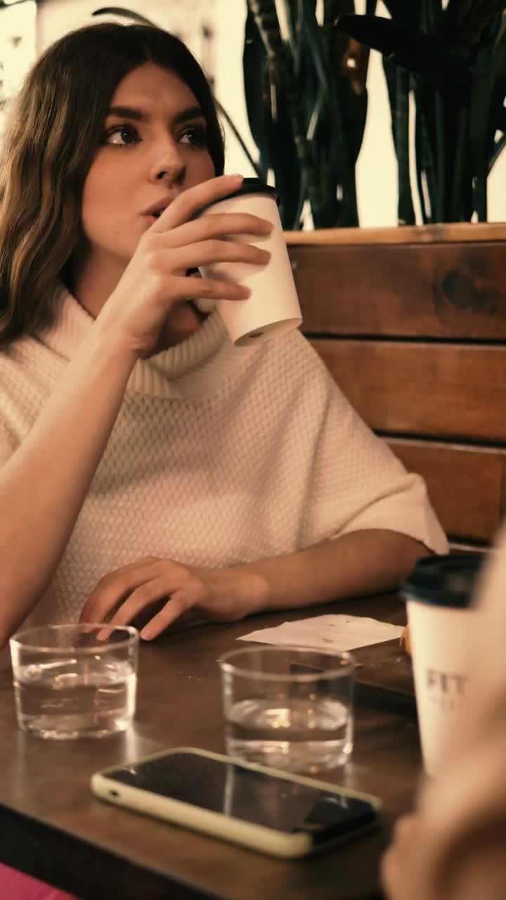 Stock Video Couple Of Girls Chatting In A Coffee Shop Live Wallpaper For PC - Free Download