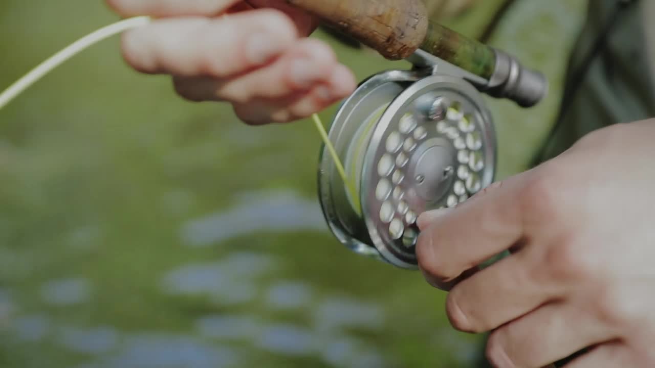 Stock Video Fisherman Rolling The Line Spool Live Wallpaper For PC - Free Download