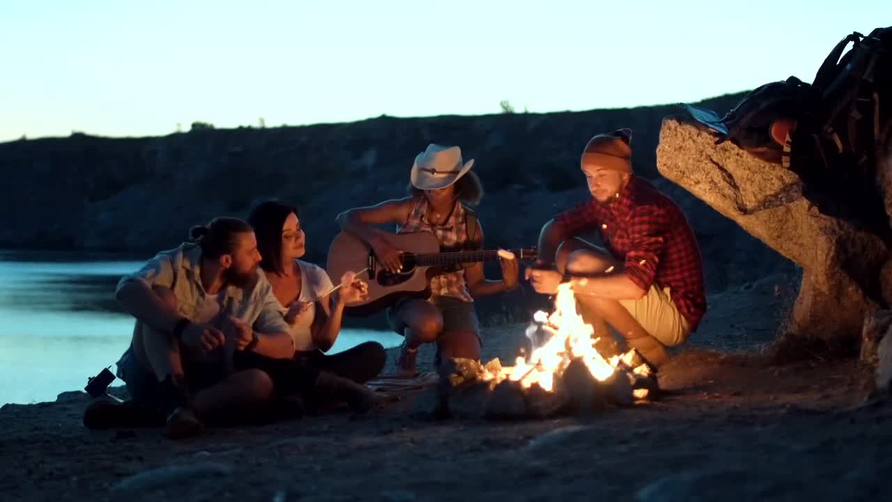 Stock Video Group Of Friends Singing Around The Campfire Live Wallpaper For PC - Free Download
