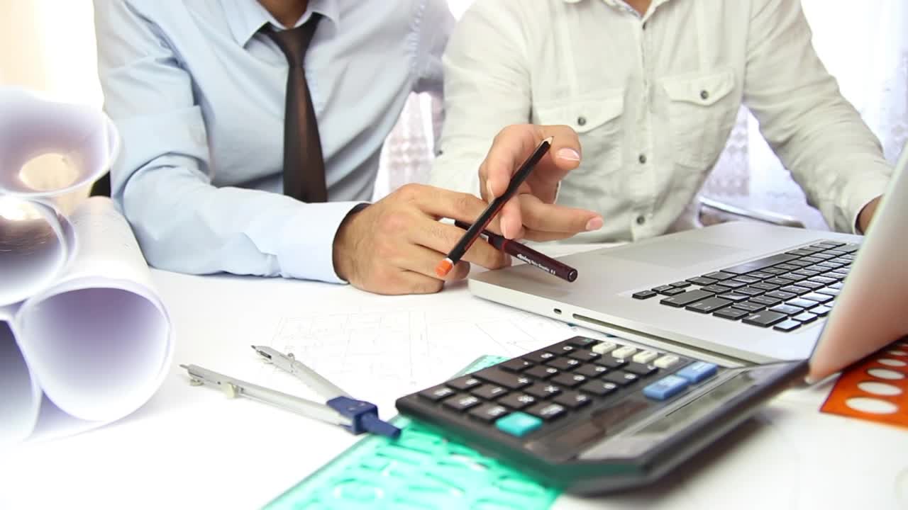 Stock Video Coworkers Discussing A Project With A Laptop Live Wallpaper For PC - Free Download