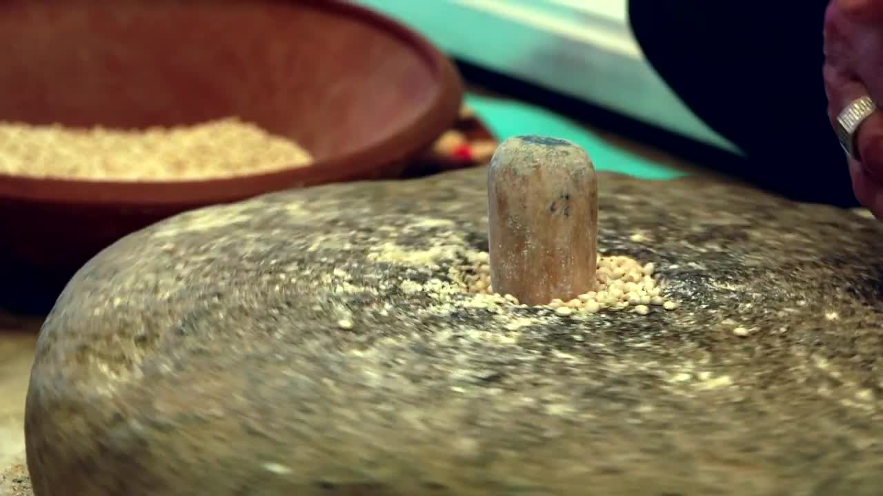Stock Video Grinding Wheat With A Rotating Stone Live Wallpaper For PC - Free Download