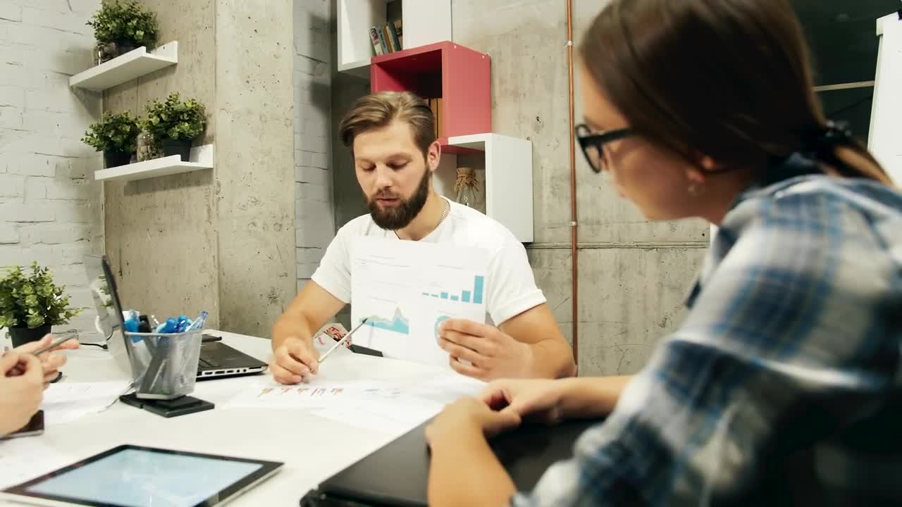 Free Video Stock team celebrates winning project results at meeting Live Wallpaper - Free Download