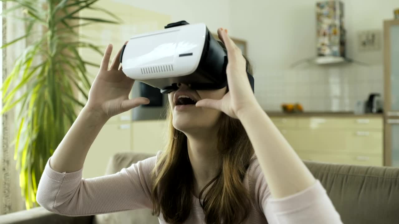 Free Video Stock surprised woman with vitual reality headset Live Wallpaper - Free Download