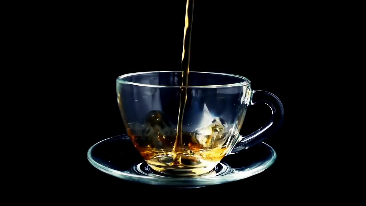 Video Stock Pouring Tea Into A Glass Cup Live Wallpaper Free - Free Download