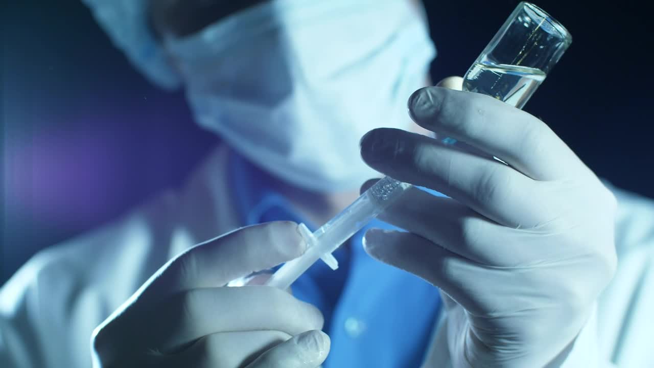 Stock Video Doctor Filling A Syringe With Anesthesia Live Wallpaper For PC - Free Download