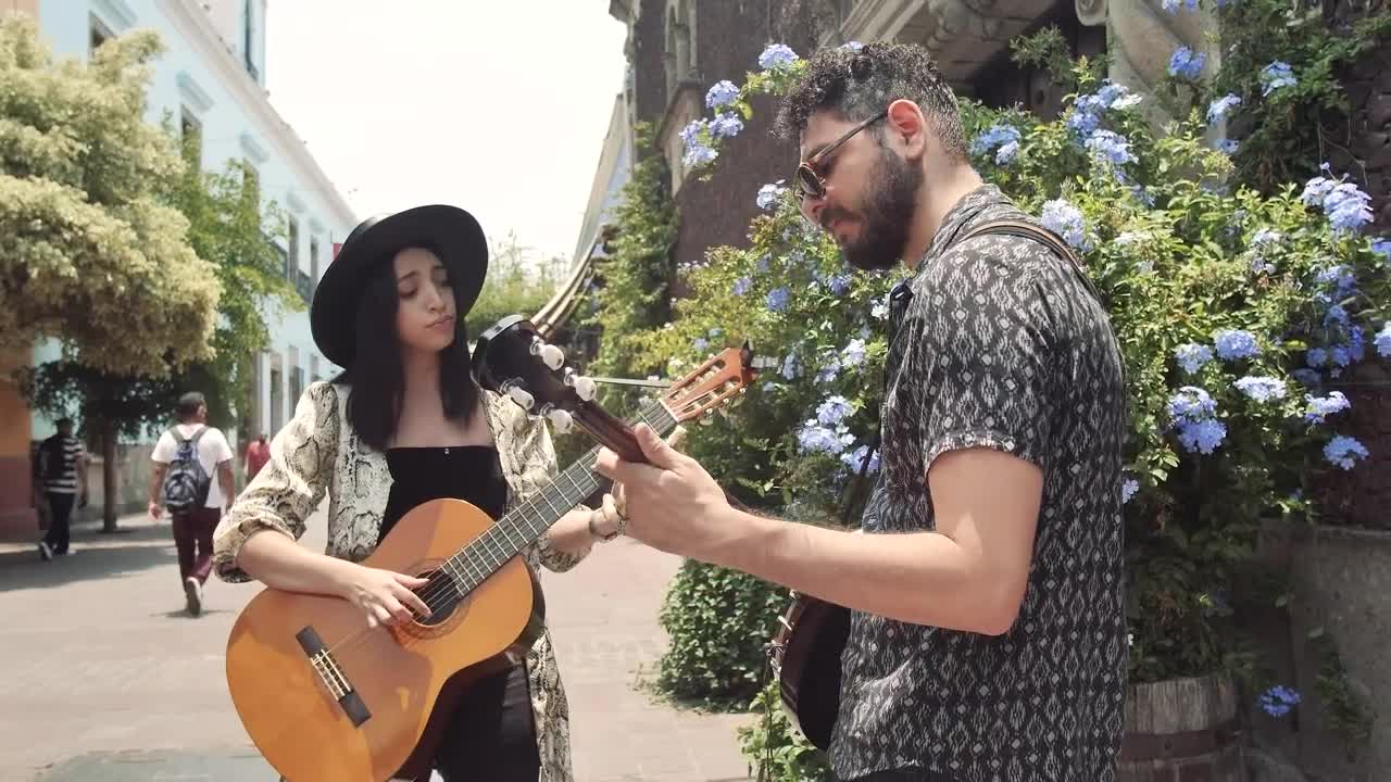 Stock Video Duo Playing Music Together On A Colonial Street Live Wallpaper For PC - Free Download
