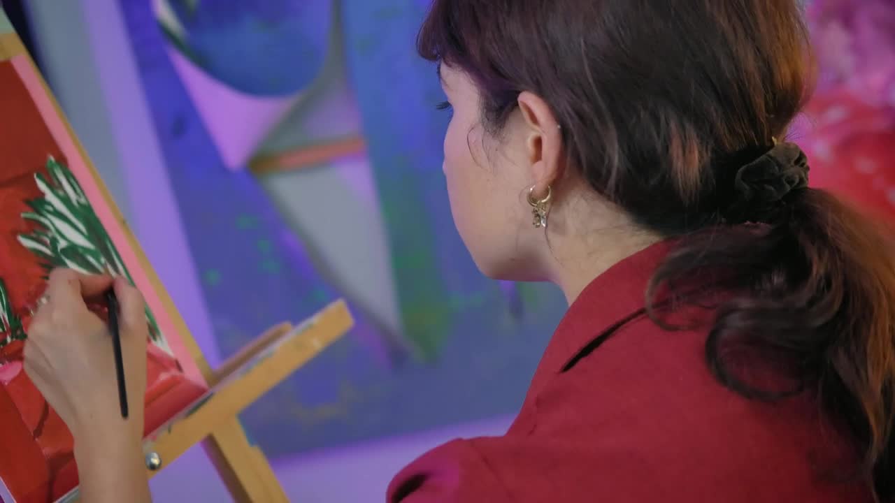 Stock Video Female Artist Painting A Picture In A Workshop 4160 Live Wallpaper For PC - Free Download