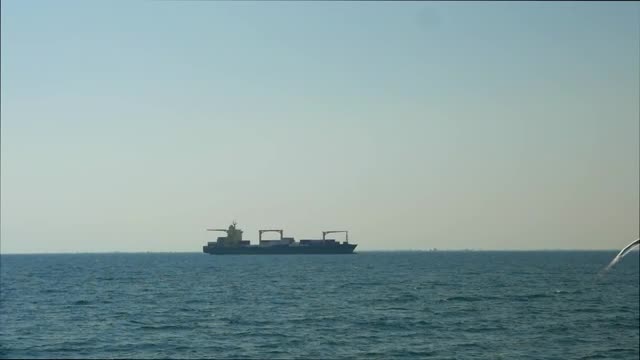 Stock Video Large Container Ship Out In The Ocean Smal Animated Wallpaper - Free Download