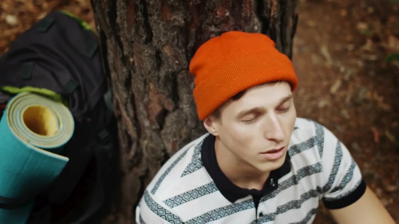 Free Stock Video Resting Hiker Thinking With Eyes Closed Looks Up In Wonder Live Wallpaper - Free Download