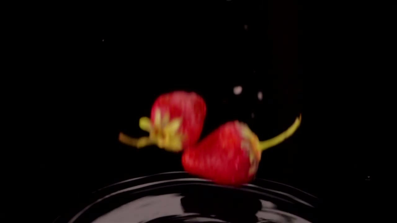 Free Video Stock Strawberries Falling Into A Black Water Live Wallpaper - Free Download
