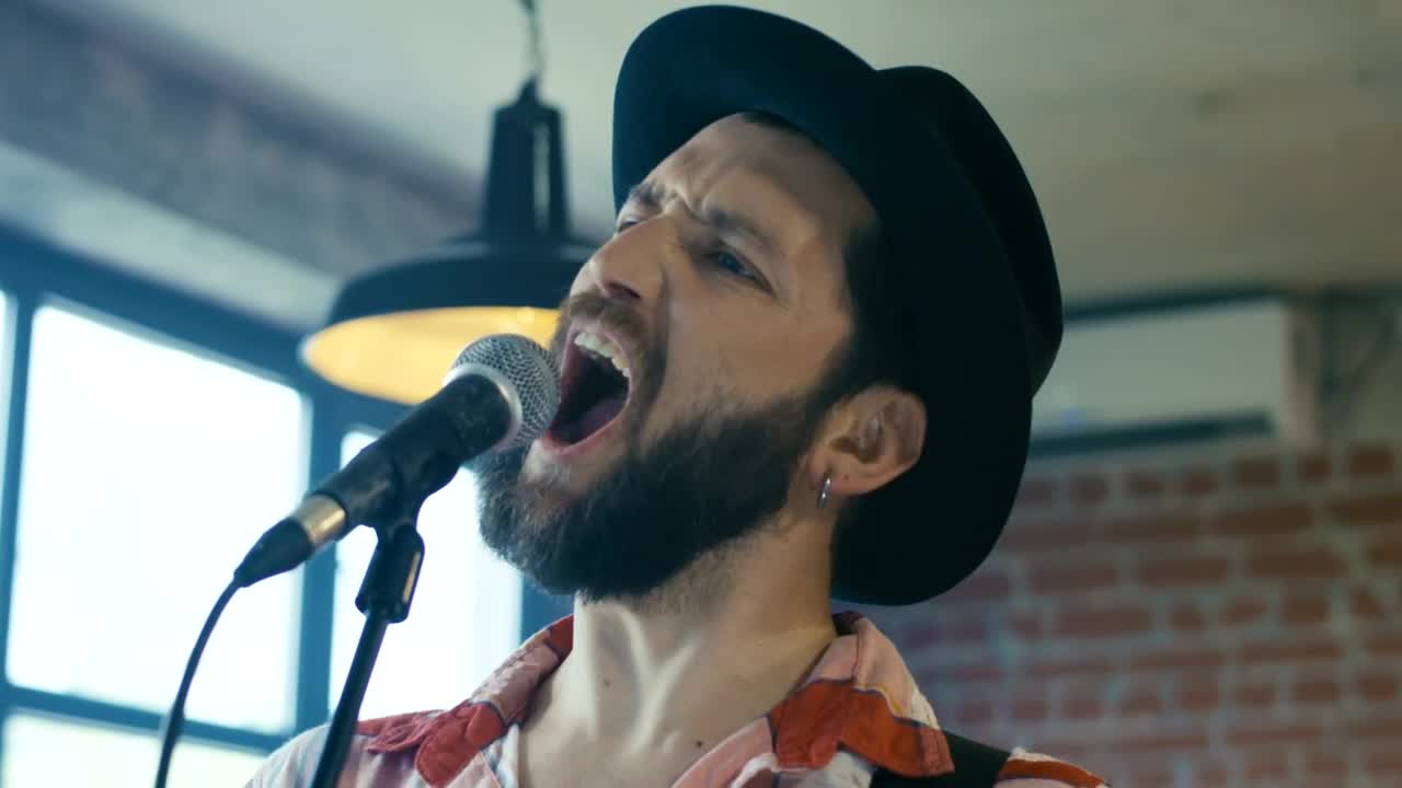 Free Stock Video Singing In A Hat With A Microphone Live Wallpaper - Free Download