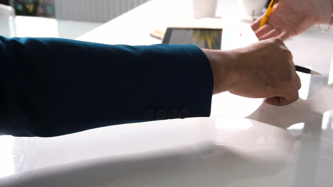 Stock Video Female Boss Writes Her Name On A Contract Live Wallpaper For PC - Free Download