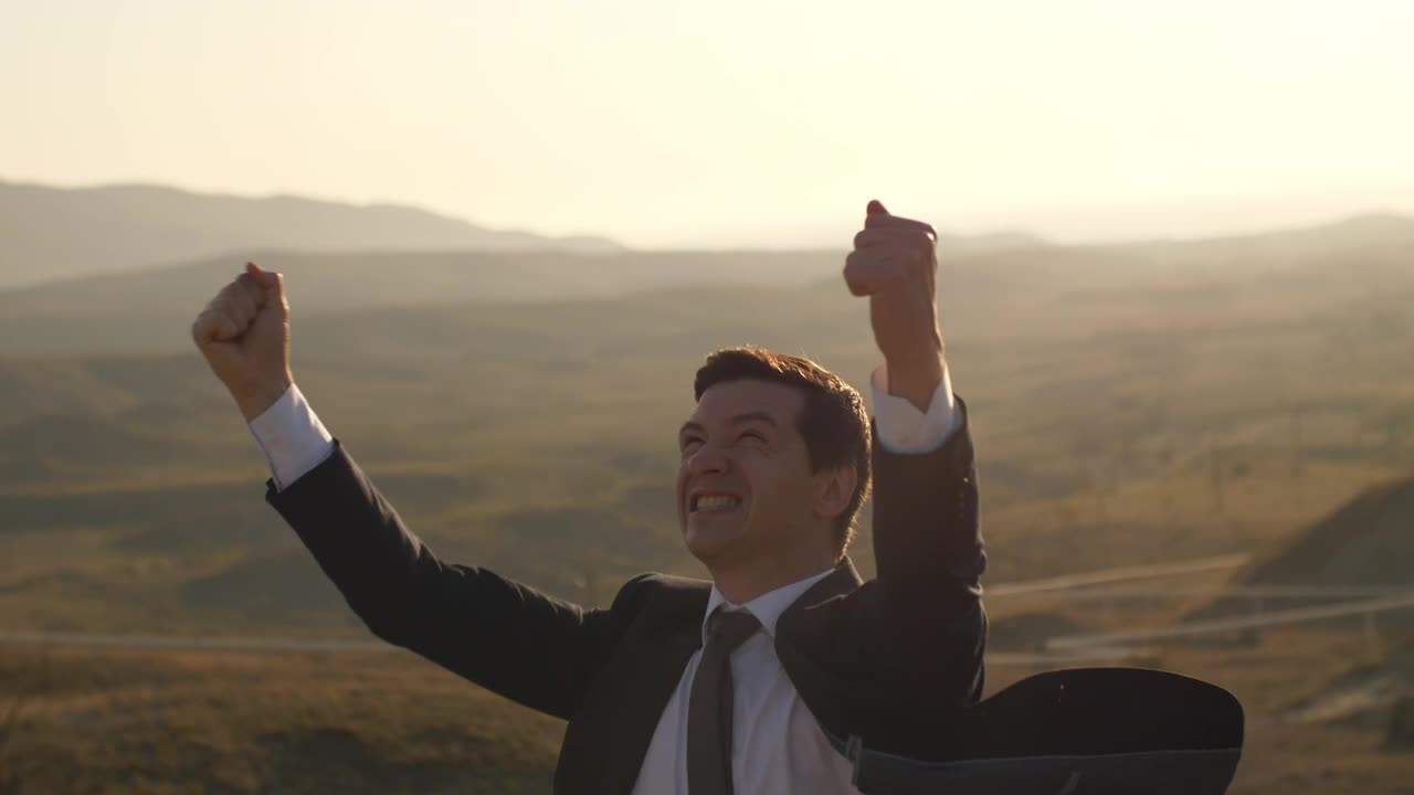 Stock Video Entrepreneur Who Wears A Suit Celebrating Live Wallpaper For PC - Free Download