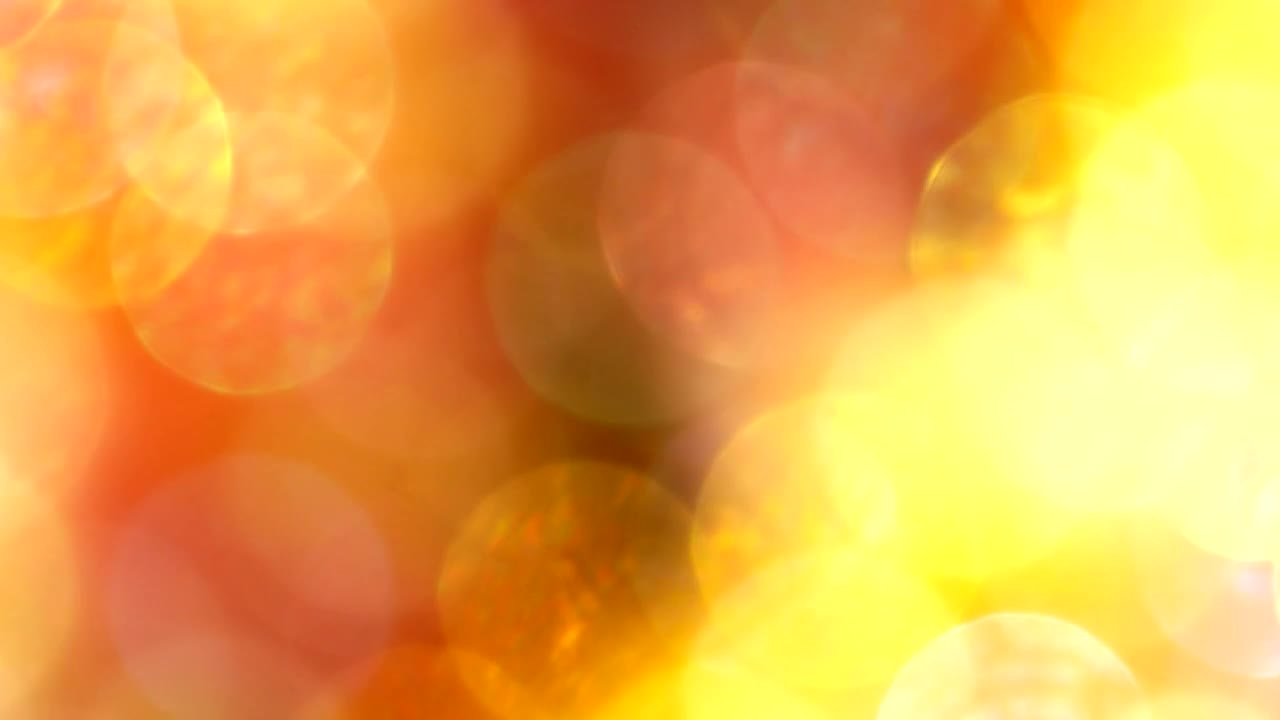 Free Video Stock Spinning Bokeh With A Yellow Filter Live Wallpaper - Free Download