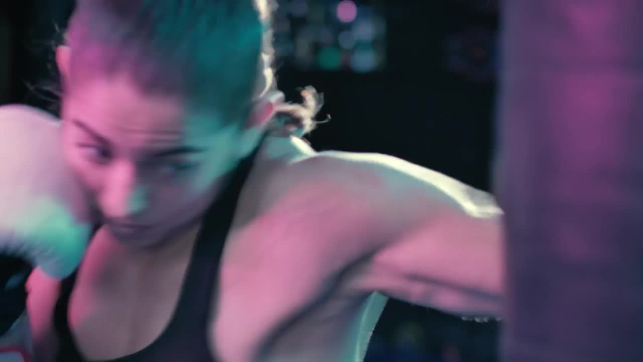 Stock Video Female Boxer Training With A Punching Bag Live Wallpaper For PC - Free Download