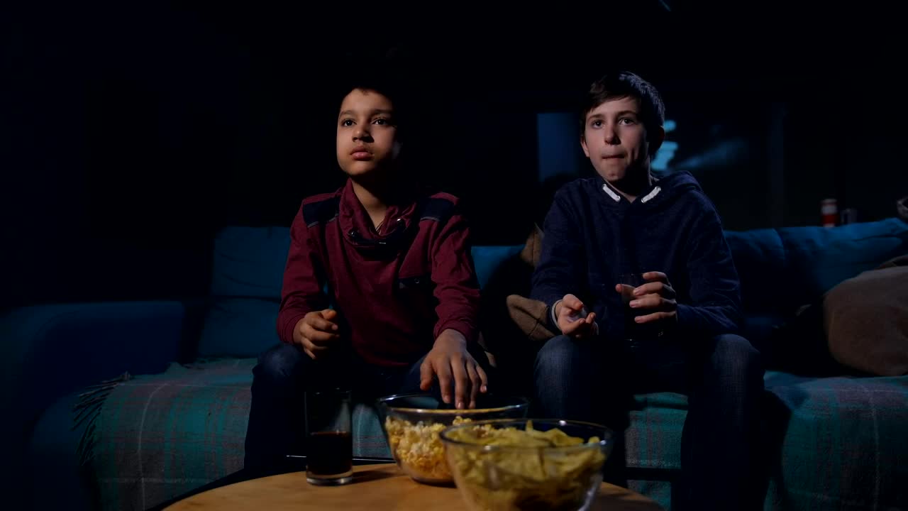 Stock Video Eating Popcorn While Watching A Horror Film Live Wallpaper For PC - Free Download