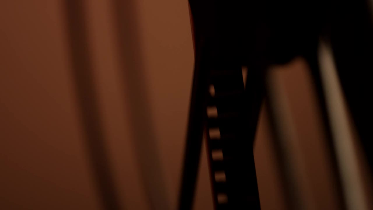 Free Stock Video Silhouette Of An Old Film Spinning Live Wallpaper - Free Download