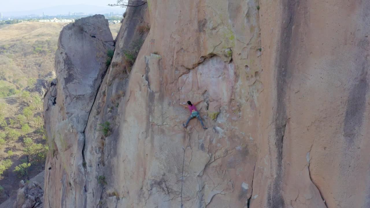 Stock Video Female Mountaineer Climbing On Top Of A Mountain Live Wallpaper For PC - Free Download
