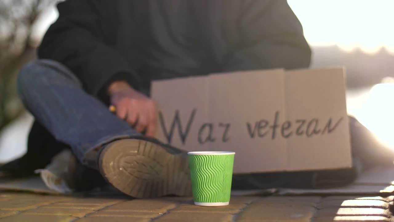 Stock Video Giving Money To A Homeless Man Live Wallpaper For PC - Free Download