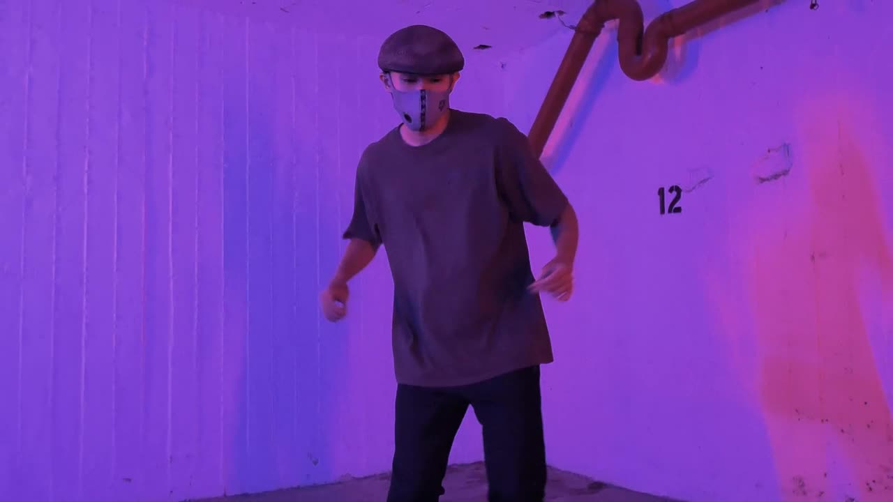 Free Video Stock Skillful Boy Dancing Break Dance With A Face Mask Live Wallpaper - Free Download