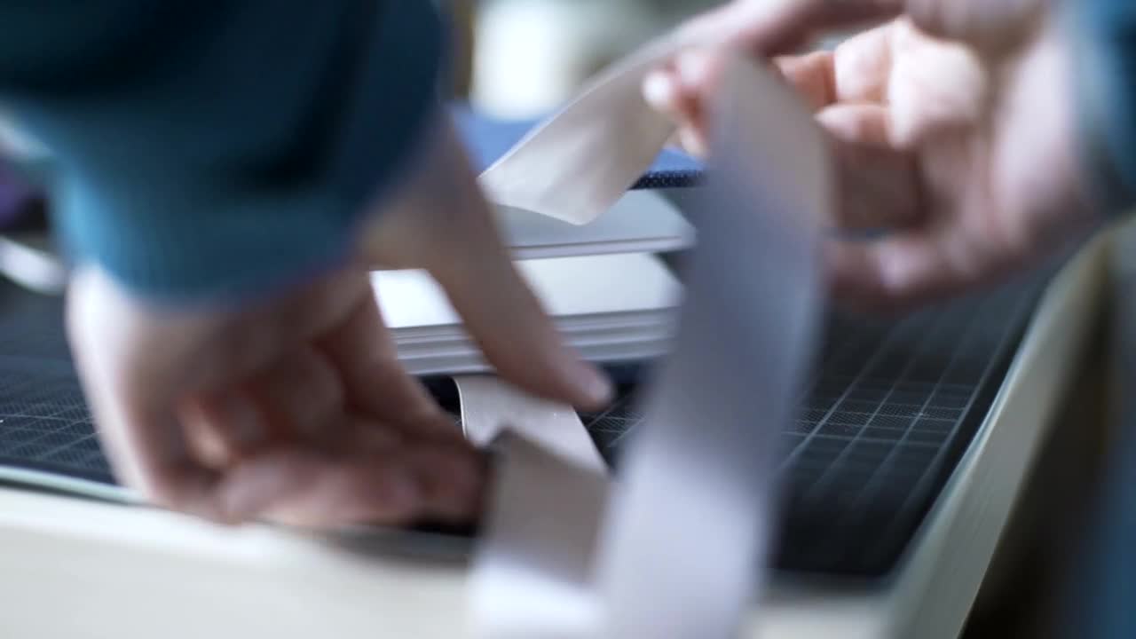 Free Video Stock the hands tie a ribbon on a gift Live Wallpaper - Free Download