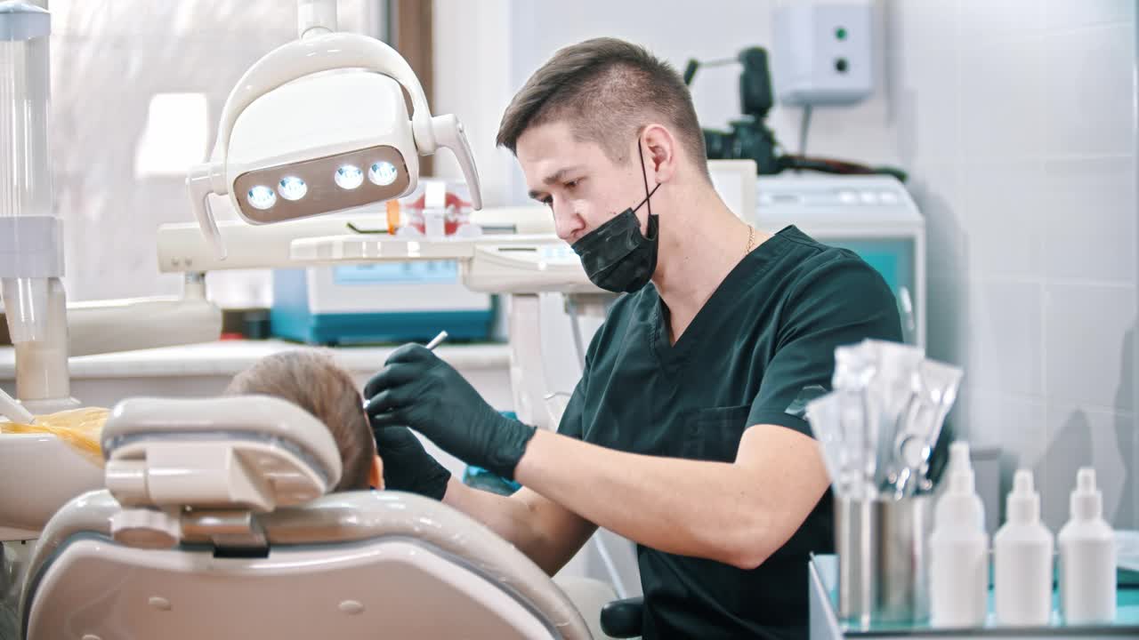 Stock Video Dentist In The Distance Attending To A Child Live Wallpaper For PC - Free Download