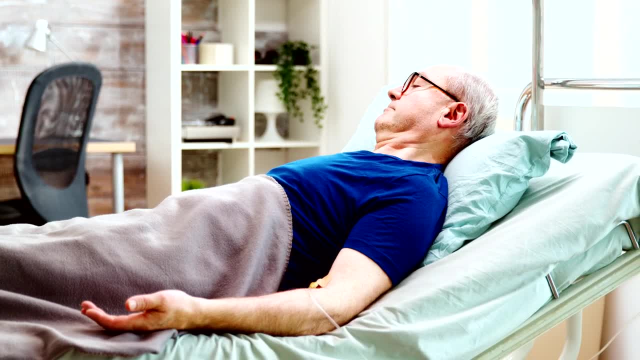 Free Stock Video Sick Elderly Man Lays On Hospital Bed In Home Care Live Wallpaper - Free Download