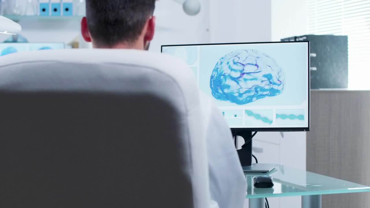 Free Stock Video Scientist Studies D Brain Model In Modern Medical Office Live Wallpaper - Free Download