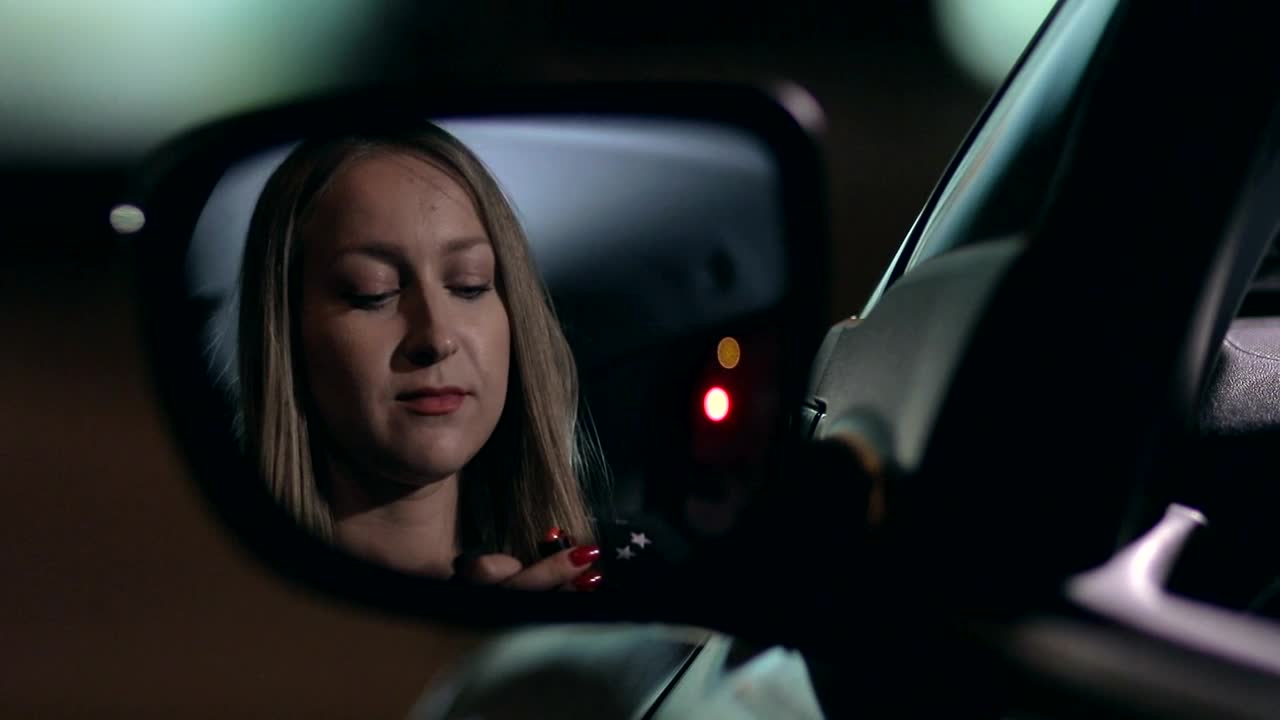Stock Footage Woman Applying Lipstick In A Car Live Wallpaper - Free Download