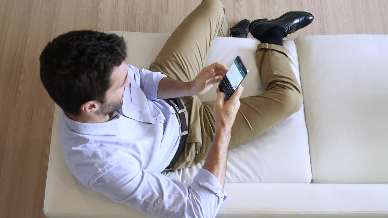 Stock Video Man Sending A Text Message While Relaxin Animated Wallpaper - Free Download