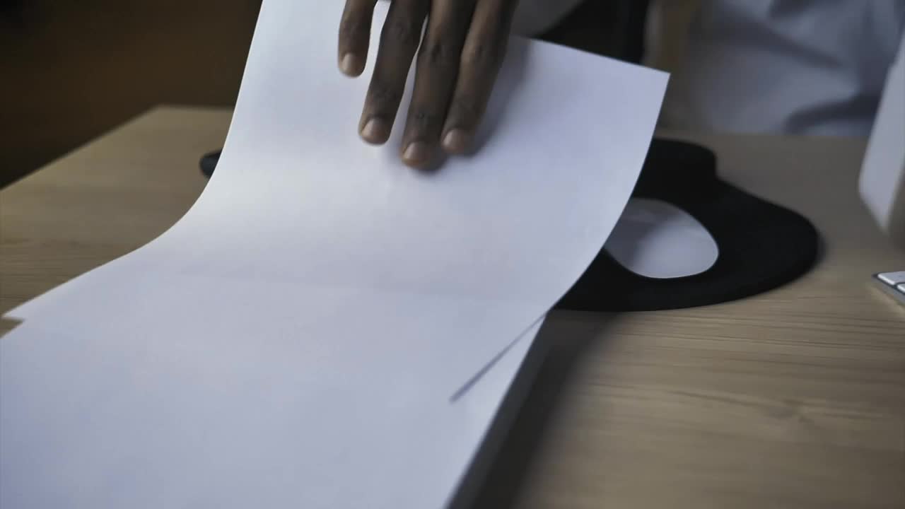 Stock Video Hand Of A Person Taking A Blank Sheet Of Paper Live Wallpaper For PC - Free Download