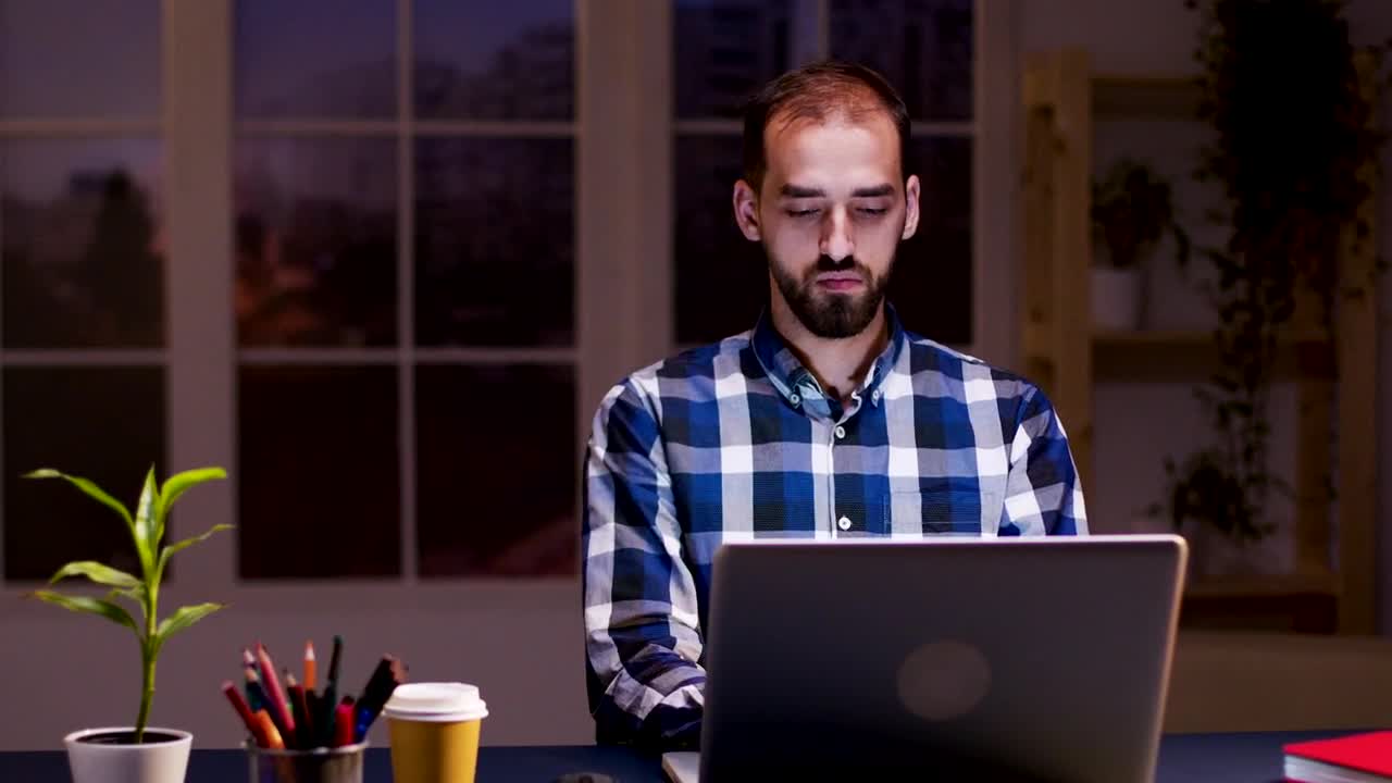 Stock Video Deep Thinking Man Working On Laptop From Home Live Wallpaper For PC - Free Download