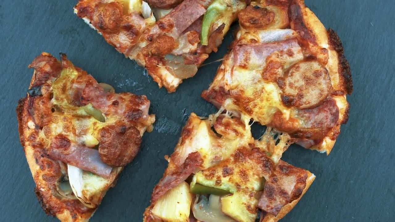 Free Video Stock Small Pizza Cut Into Four Live Wallpaper - Free Download