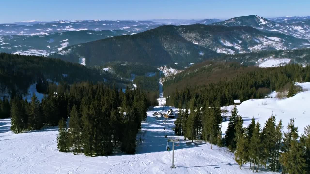 Stock Video Flying Over A Mountainous Forest In Winter Live Wallpaper For PC - Free Download
