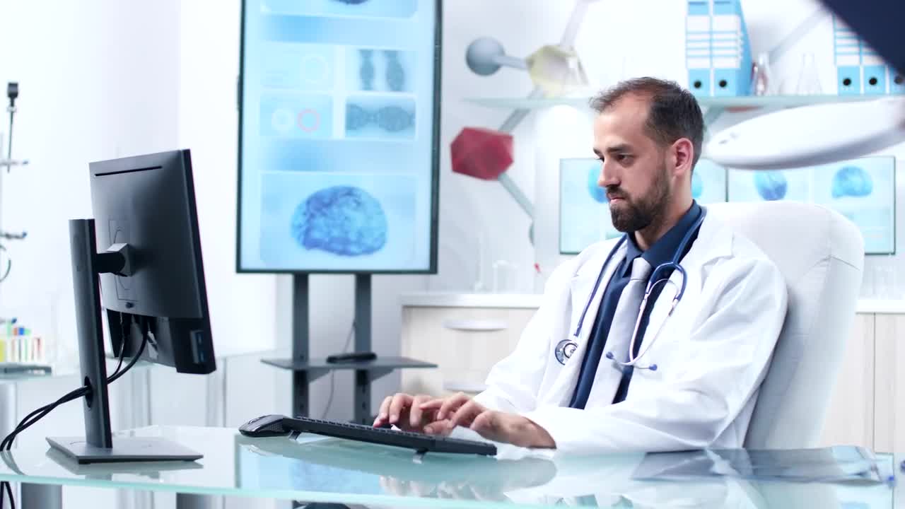 Stock Video Doctor Working In Hospital Office Is Handed Reports Live Wallpaper For PC - Free Download