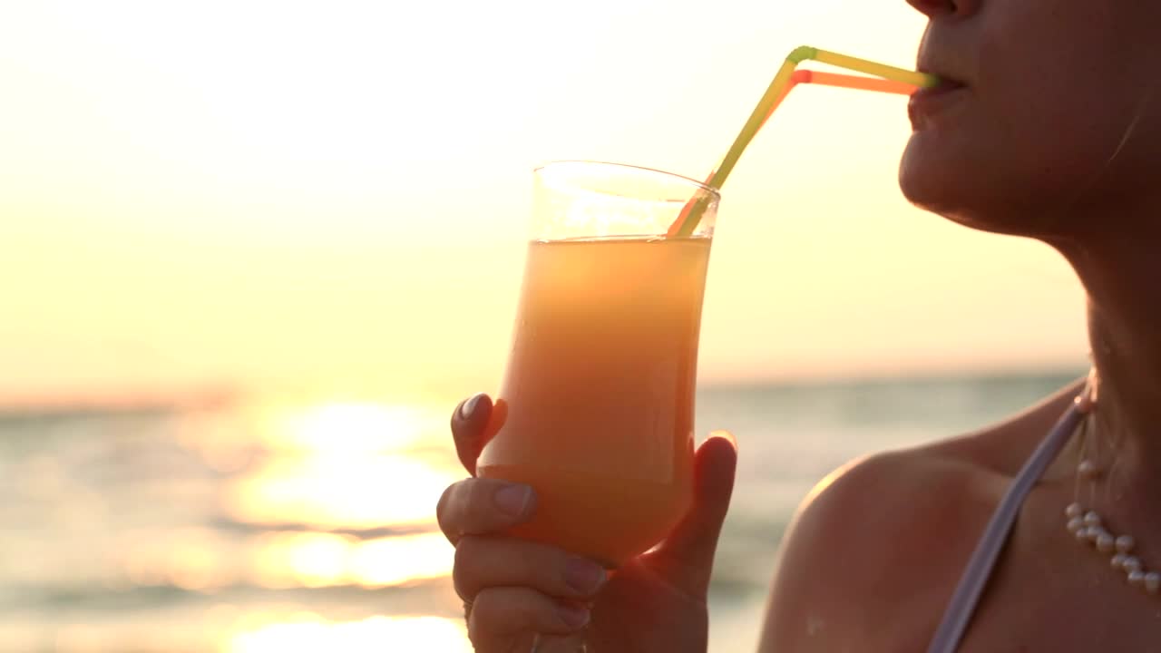 Stock Video Drinking An Orange Cocktail Live Wallpaper For PC - Free Download