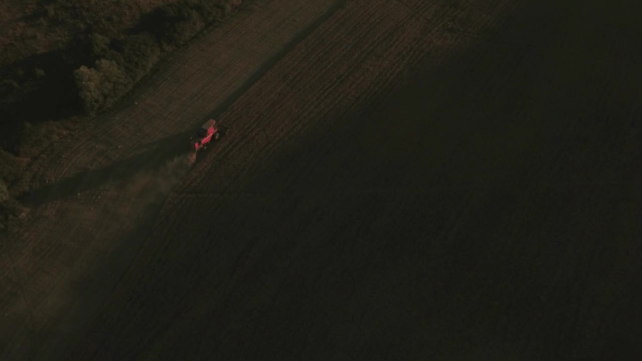 Free Video Stock tractor moving across a field Live Wallpaper - Free Download