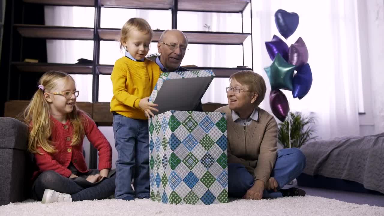 Free Video Stock Small Child Unwrapping A Tank Live Wallpaper - Free Download