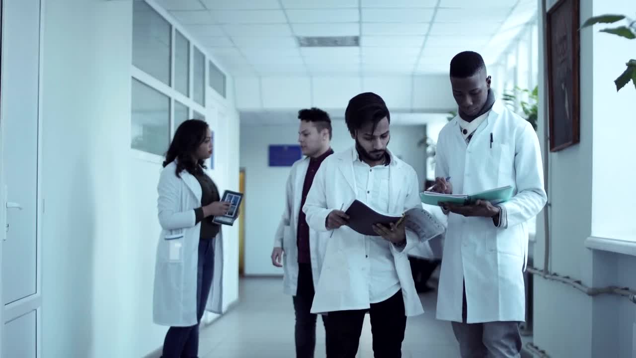 Stock Video Medical Students Converse In The Hal Animated Wallpaper - Free Download