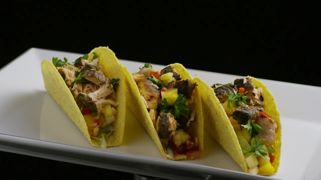 Free Video Stock tacos rotating on a plate on a black background Live Wallpaper - Free Download