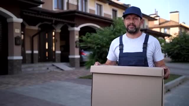 Stock Video Delivery Man Carrying A Large Box  Smal Live Wallpaper For PC - Free Download