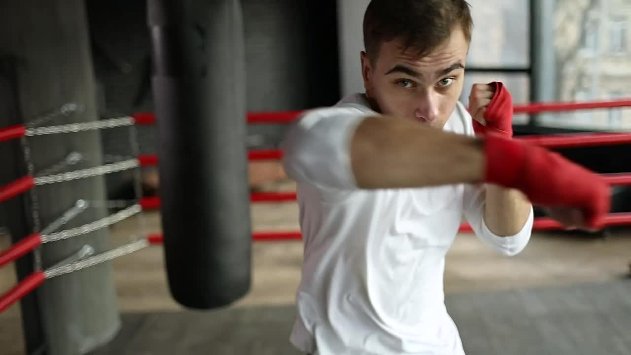 Stock Video Man Shows Off Boxing Moves With Red Handwrap Animated Wallpaper - Free Download