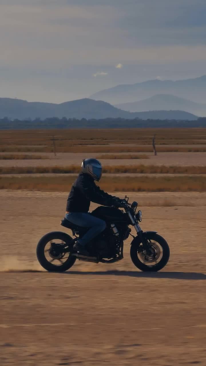 Stock Video Motorcyclist Speeding Through A Desert Live Wallpaper - Free Download