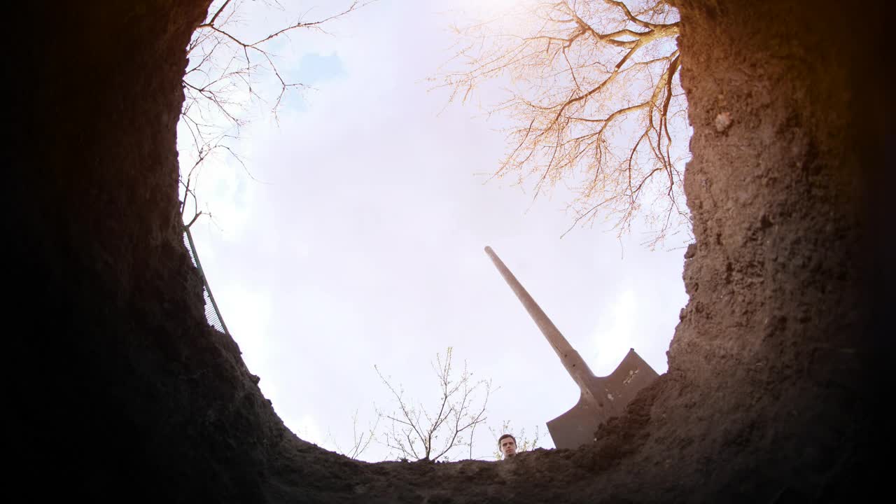 Stock Video Person Filling A Hole In The Ground Live Wallpaper - Free Download