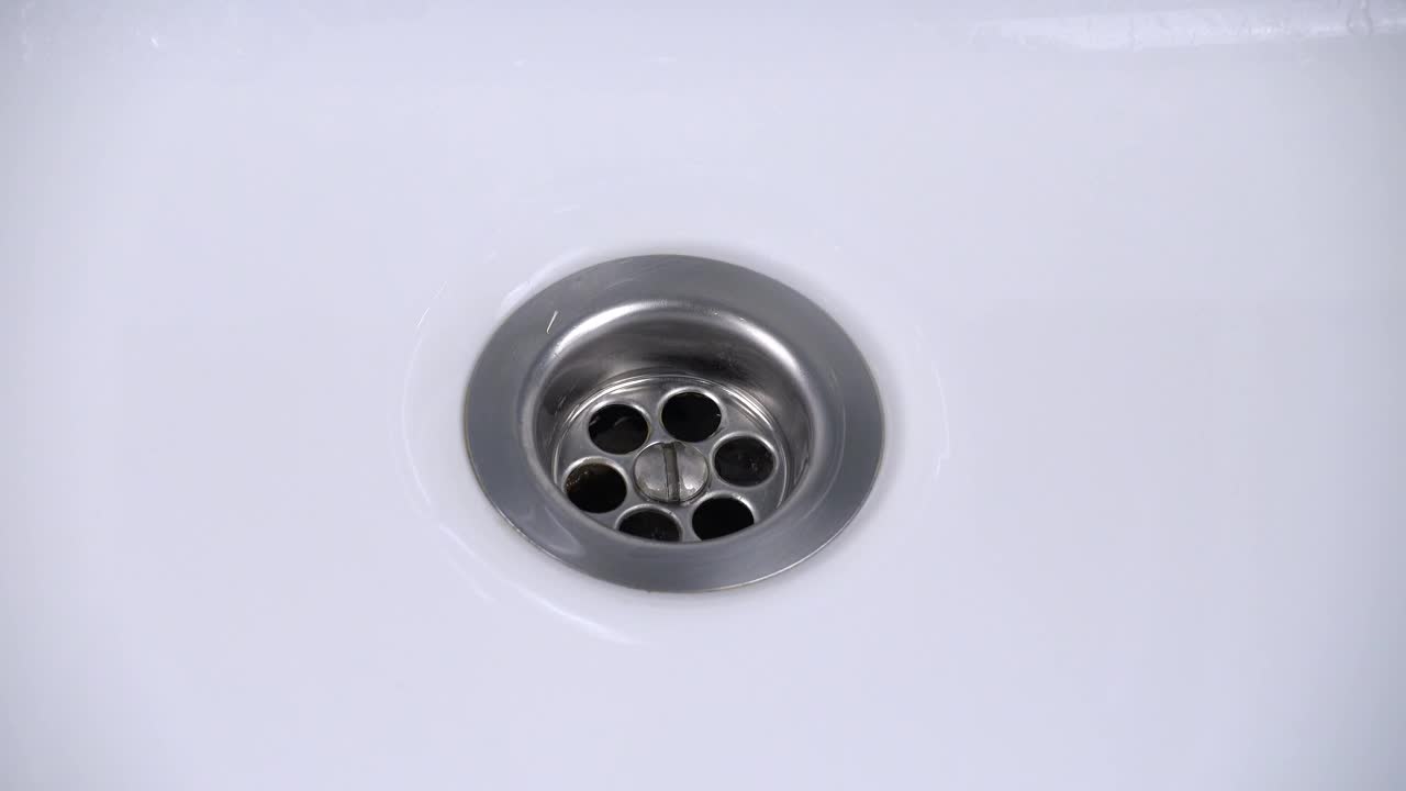 Stock Footage Water Goes Down The Drain In The Bathroom Live Wallpaper - Free Download